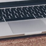 white and black laptop