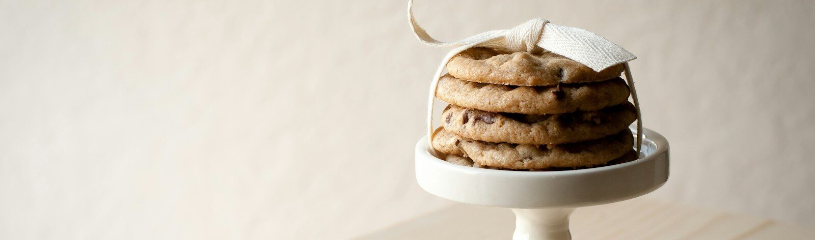 cookies on white footed saucer